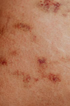 Detailed view of skin with red spots and discoloration, common in dermatology studies.