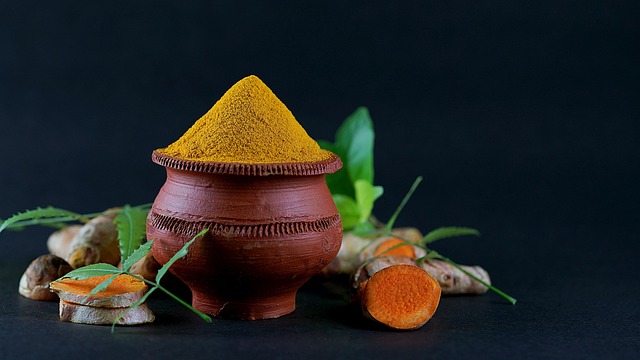 turmeric, neem, cup, spoon, undried turmeric, black background, wood spoon, full of turmeric, leaf, nature, dramatic