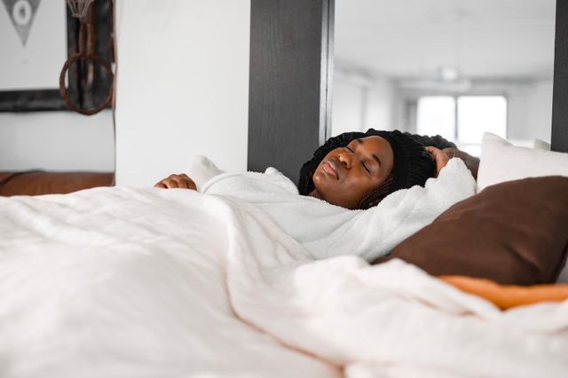Woman over 40 focusing on sleep and metabolic health during menopause.